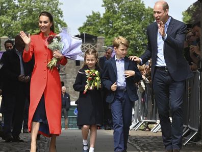 Britain's Kate, Duchess of Cambridge, Princess Charlotte, Prince George and Prince William during their visit to Cardiff Castle to meet performers and crew involved in the special Platinum Jubilee Celebration Concert taking place in the castle grounds later in the afternoon, Saturday June 4, 2022, on the third of four days of celebrations to mark the Platinum Jubilee. The events over a long holiday weekend in the U.K. are meant to celebrate the monarchs 70 years of service. (Ashley Crowden/PA vi