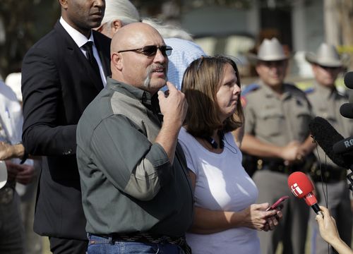Sherri Pomeroy speaks while standing next to her husband Frank Pomeroy, pastor of First Baptist Church of Sutherland Springs. (AAP)