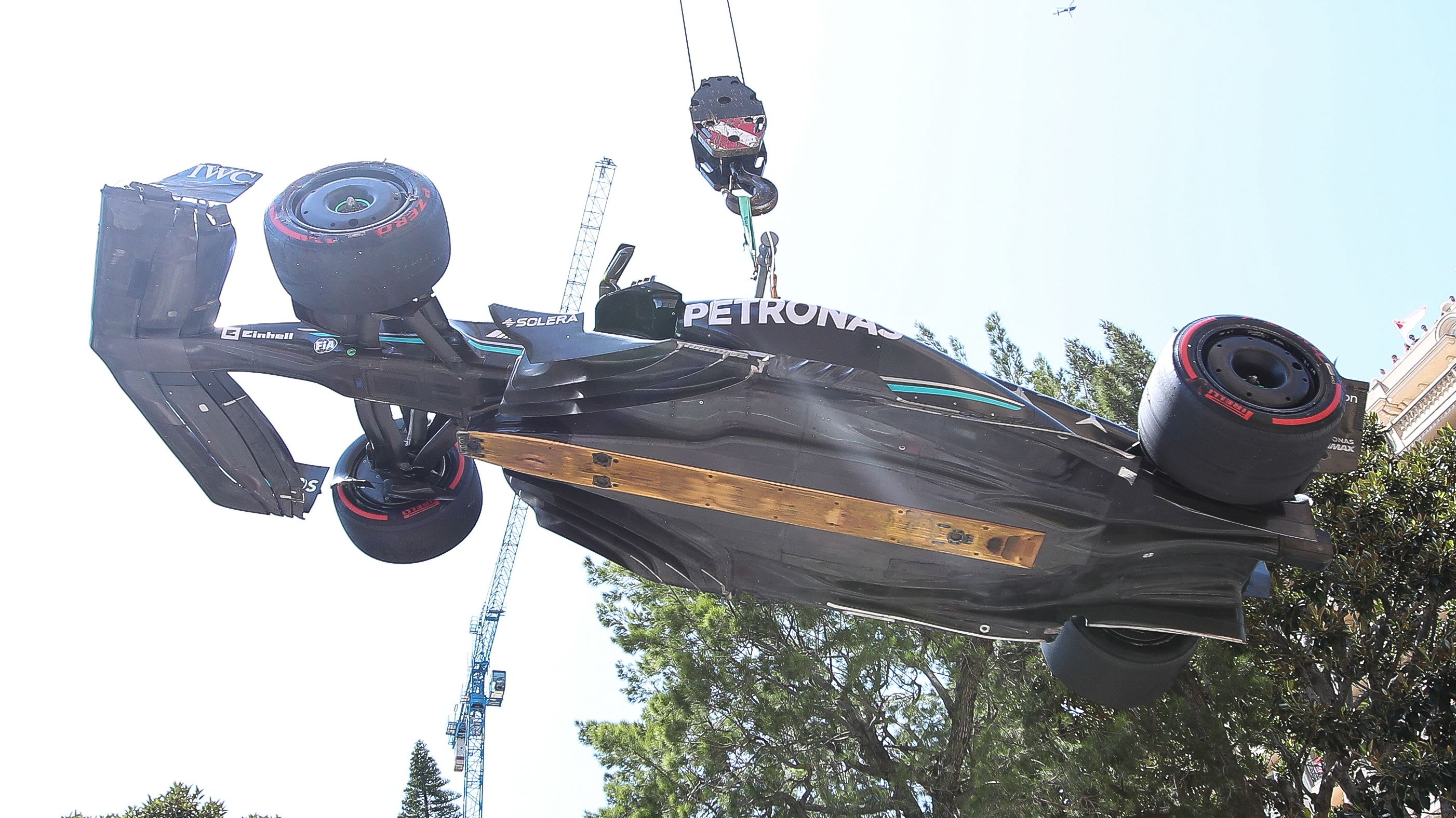 The car of Lewis Hamilton of Great Britain and Mercedes is lifted on a crane after he crashed during final practice ahead of the F1 Grand Prix of Monaco at Circuit de Monaco on May 27, 2023 in Monte-Carlo, Monaco. (Photo by Eric Alonso/Getty Images)