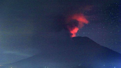 A view of the Mount Agung volcano erupting, in Karangasem, Bali island, Indonesia on November 26, 2017. (AAP)