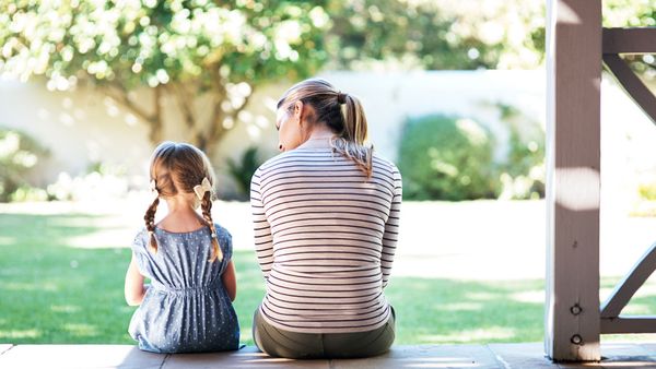 Mother talking to daughter