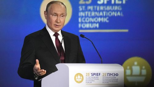 Russian President Vladimir Putin gestures as he addresses a plenary session of the St. Petersburg International Economic Forum in St. Petersburg, Russia, Friday, June 17, 2022. Putin began his address to the St. Petersburg International Economic Forum with a lengthy denunciation of countries that he contends want to weaken Russia, including the United States who, he said, "declared victory in the Cold war and later came to think of themselves as God's own messengers on planet Earth." (AP Photo/D