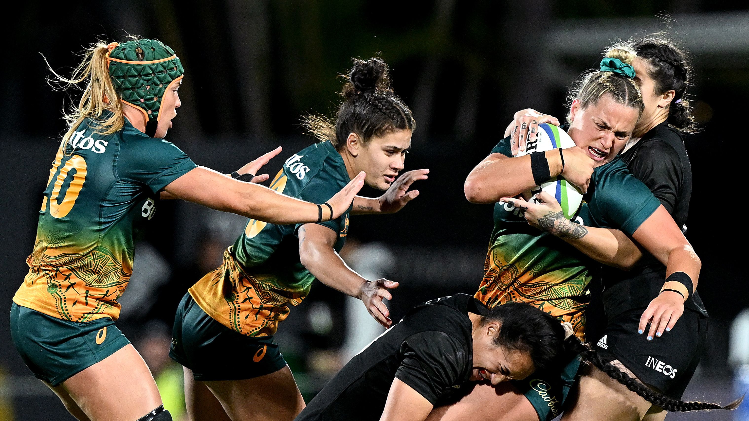 Arabella McKenzie of Australia is tackled during the Pacific Four Series &amp; O&#x27;Reilly Cup match between the Australian Wallaroos and New Zealand Black Ferns.