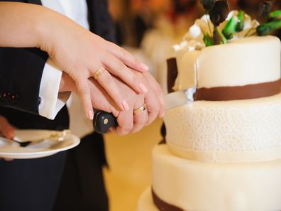 Cutting cake at wedding