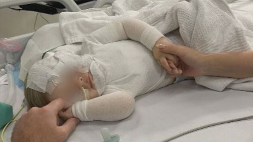 A baby boy is in hospital recovering from a horrific burns after a stranger poured hot coffee over his head in a Brisbane park. The infant, who cannot be identified under Queensland law as a child victim of crime, has suffered burns to his face and chest. The nine-month old and his mother were ambushed as they were enjoying a picnic at Hanlon Park in Stones Corner at about midday yesterday. 