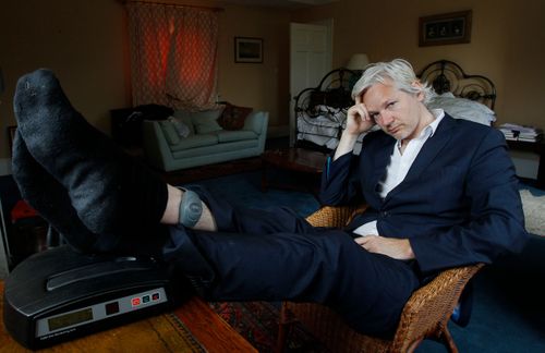 WikiLeaks founder Julian Assange is seen with his security tag around his ankle at the house he is forced to stay near Bungay, England, Wednesday, June 15, 2011. 