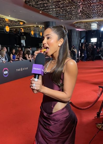 Maria Thattil enjoyed a chicken nugget on the red carpet.