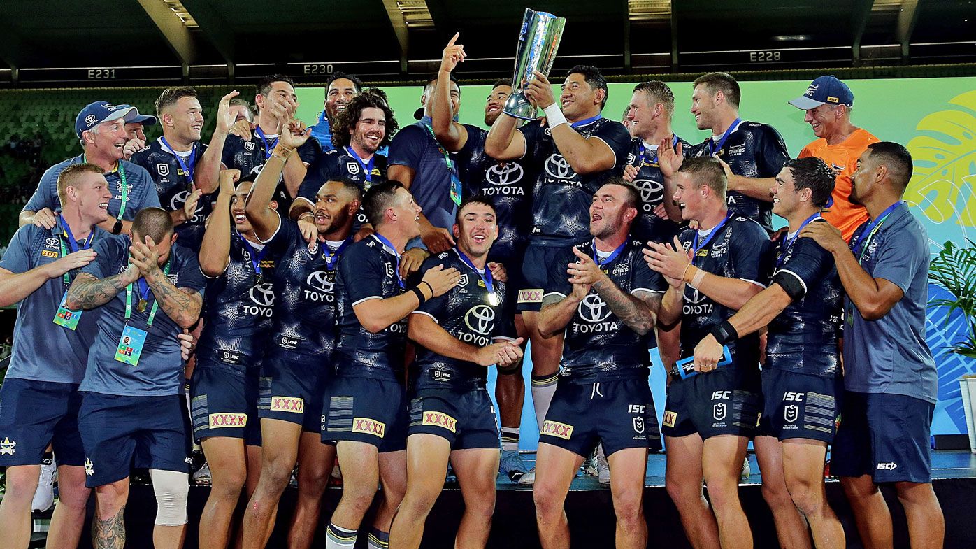 The Cowboys celebrate after winning the Final against the Dragons