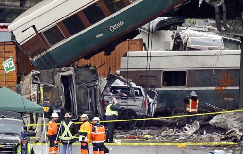 Several vehicles were destroyed when the train derailed. (AAP)