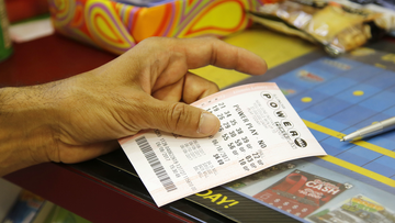 A customer buys a Powerball ticket, Thursday, June 8, 2017, in Chicago. The Powerball jackpot has grown up to $435 million, after more than two months without a winner. The jackpot for Saturday night&#x27;s drawing would tie for the nation&#x27;s 10th largest lottery prize. (AP Photo/G-Jun Yam)