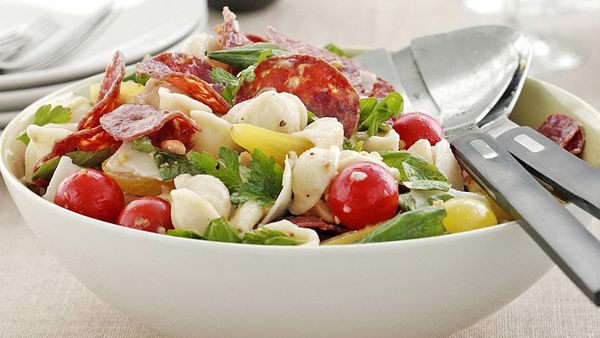 Warm salami and tomato pasta salad