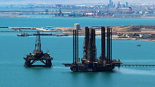 Oil platforms in sea (Getty)