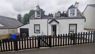 UK Scotland cottage rural house fire no roof unusual 