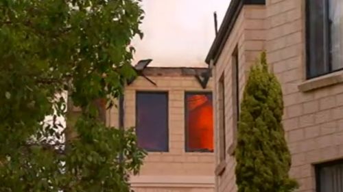 The fire badly damaged the student accommodation and forced the evacuation of 60 students. (9NEWS)