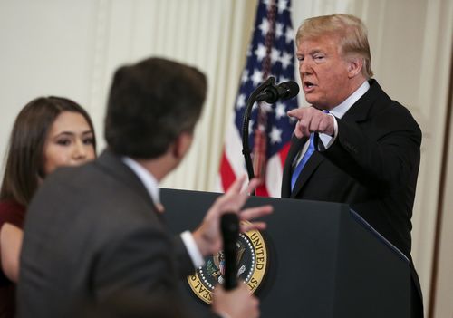 In amazing scenes, a White House aide tried to grab the microphone from Acosta.