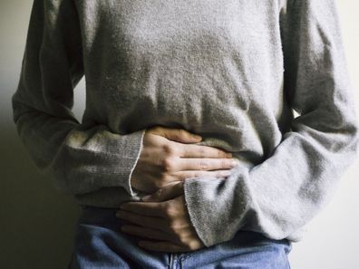 Woman suffering from bloating