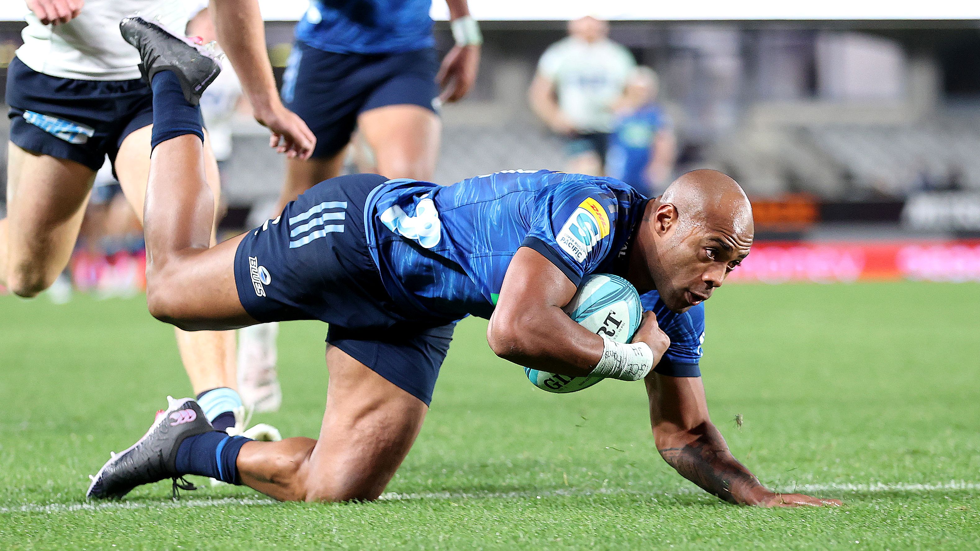 Mark Telea of the Blues scores a try during the Super Rugby Pacific quarter final match between Blues and Waratahs at Eden Park.