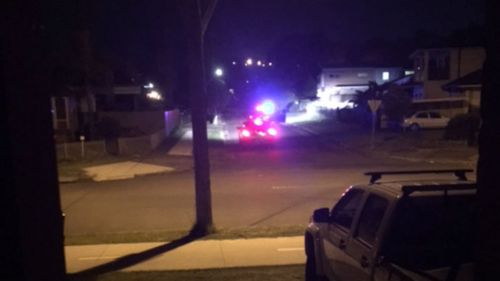 A police car rushes to the scene in Ashcroft. (Dominic Baljak)