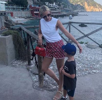 Roxy Jacenko in Chanel shorts with children Pixie Rose and Hunter Curtis in Capri, Italy