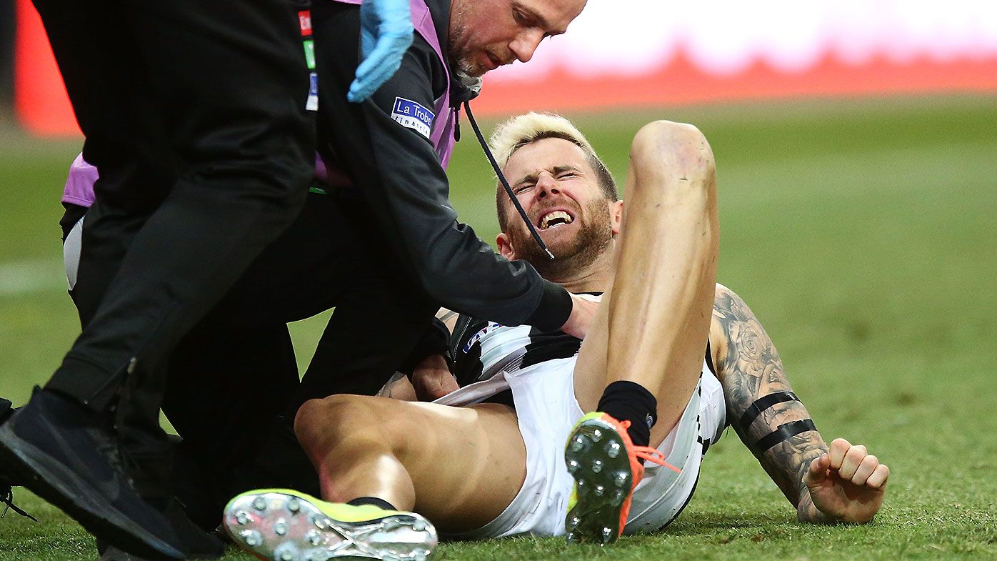 Collingwood star Jeremy Howe 'shattered' after 'sickening' knee injury puts season in jeopardy