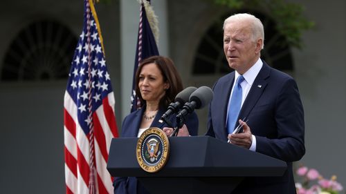 President Joe Biden delivers remarks on the COVID-19 response and vaccination program as Vice President Kamala Harris listens in the Rose Garden of the White House on May 13, 2021 in Washington, DC. 