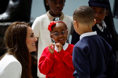 LONDON, ENGLAND - JUNE 22: Catherine, Duchess of Cambridge speaks with guests during the unveiling of the National Windrush Monument at Waterloo Station on June 22, 2022 in London, England. (Photo by John Sibley - WPA Pool/Getty Images)