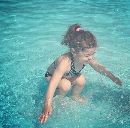 Is she in the water or above it? The picture of a young girl baffling the internet