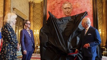 King Charles III and Queen Camilla at the unveiling of artist Jonathan Yeo&#x27;s portrait of the King, in the blue drawing room at Buckingham Palace, in London, Tuesday May 14, 2024.  