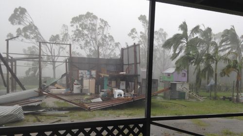 Opportunistic thieves arrested after allegedly breaking into bottle shop in cyclone Marcia's wake