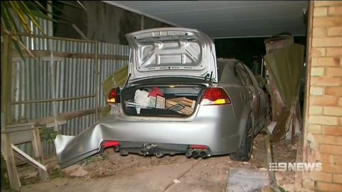A man and woman have been charged after slamming a stolen car into the garage of a South Australian home.