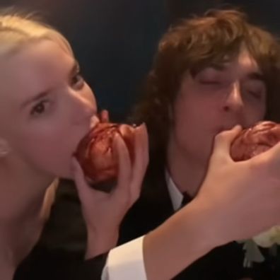 Anya Taylor-Joy and husband Malcolm McRae eat "anatomically correct heart cakes".