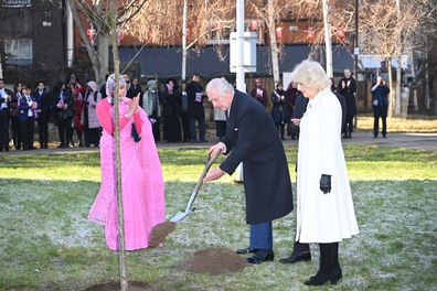 King Charles III and Camilla, Queen Consort plant a tree in the Altab Ali Park during a visit to the Bangladeshi community of Brick Lane on February 8, 2023 in London, England.  