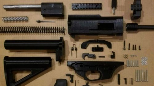 An Adelaide man has been accused of plotting a terror attack by amassing weapons, explosive material and key tactical information.