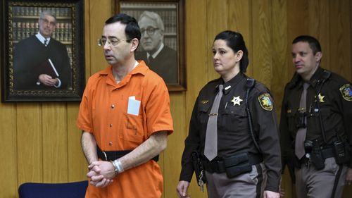 Larry Nassar enters Judge Janice Cunningham's circuit courtroom on January 31, 2018. (AAP)
