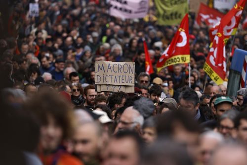 Demonstrators march during a protest Thursday, April 6, 2023 in Nantes, western France. 