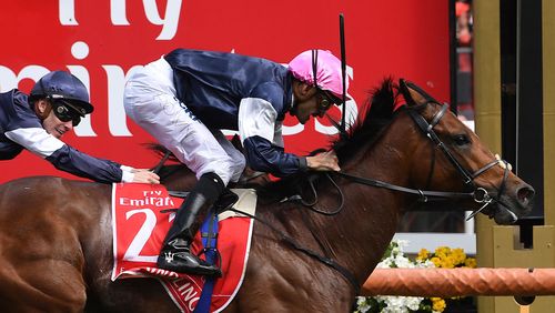 Rekindling wins another Melbourne Cup for Lloyd Williams. (AAP)