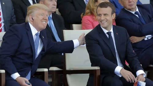 Donald Trump and French President Emanuel Macron at the Bastille Day parade. (AAP)