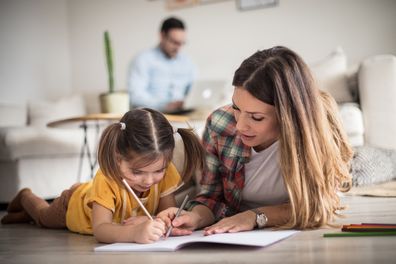 Daughter and mother working on homework