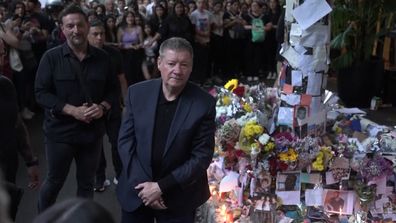 Liam Payne's father Geoff Payne greets mourning fans at memorial outside of Buenos Aires' Casa Sur hotel