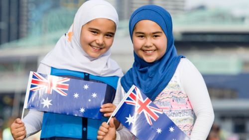 Thousands raised for billboard featuring Muslim girls celebrating Australia Day to be put back up