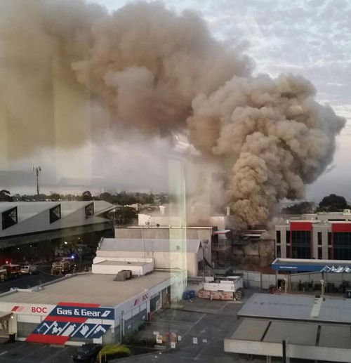 Smoke billows from the building. (Supplied)