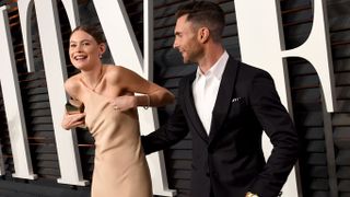 Adam Levine saves his wife from a major nip-slip snafu