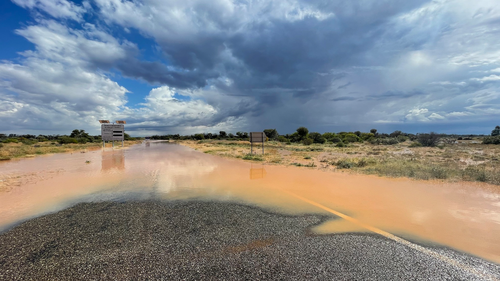 Flooding is seen on Silver City Highway just south of Packsaddle in the NSW outback.
