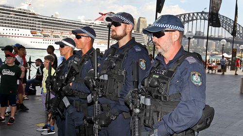 Police armed with M4 rifles will be patrolling the CBD. (AAP)