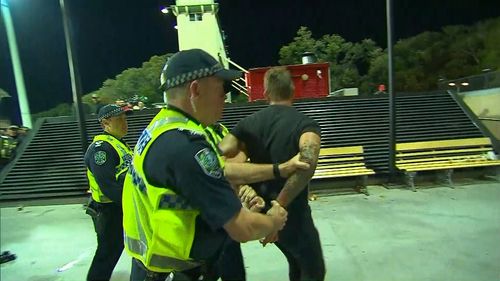 Police handcuffed a handful of patrons after the game.