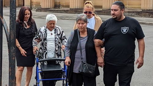 The family of Hasan Dastan leave the New South Wales Supreme Court.