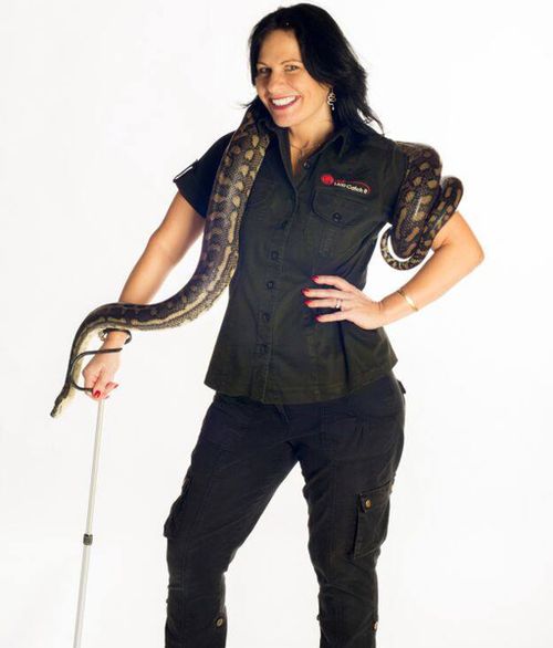 Julia Baker has made a career of wrangling snakes. (Facebook)