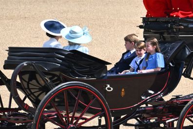 Catherine, Duchess of Cambridge, Camilla, Duchess of Cornwall, Prince George of Cambridge, Prince Louis of Cambridge and Princess Charlotte of Cambridge ride in a carriage during the Trooping the Colour parade at Buckingham Palace on June 02, 2022 in London, England