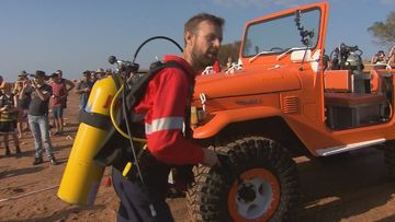 A Top End team has broken two world records for the longest and deepest drive underwater.