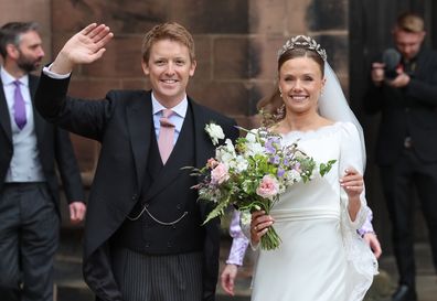 Hugh Grosvenor, Duke of Westminster and Olivia Grosvenor, Duchess of Westminster wave and smile to well-wishers after their wedding ceremony at Chester Cathedral on June 07, 2024 in Chester, England.
